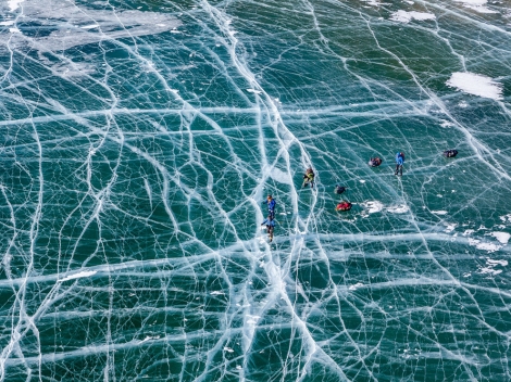 Skaters on Lake Baikal, Russia by Evgeny Dubinchuk